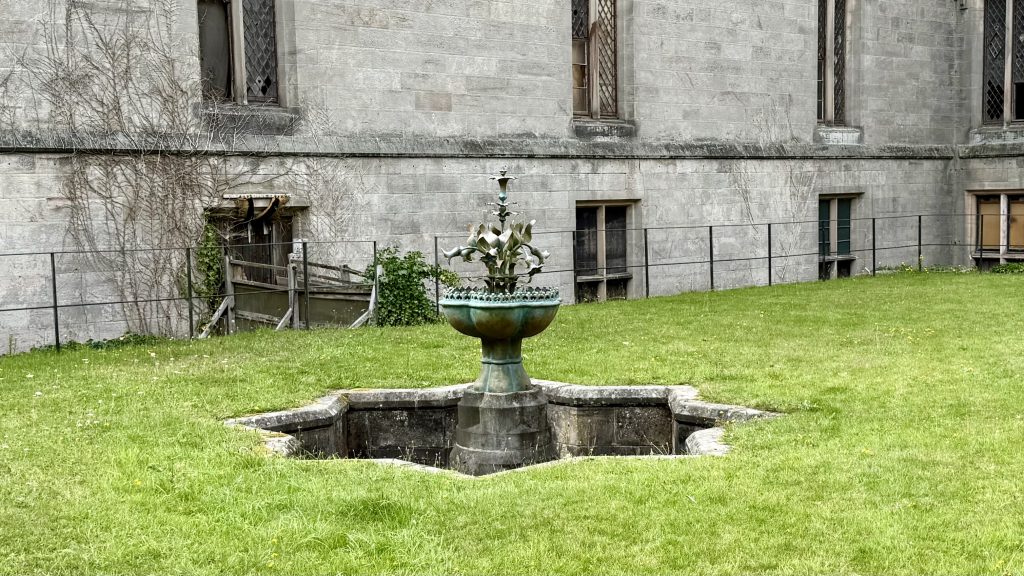 A water fountain in a courtyard.
